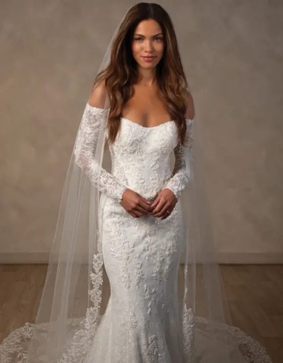 Model wearing a gown by Essense of Australia
