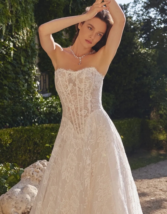 Model wearing a gown by Justin Alexander