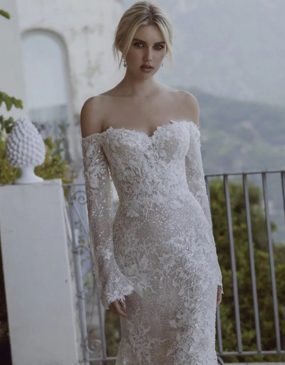 Model wearing a gown by Ricca Sposa