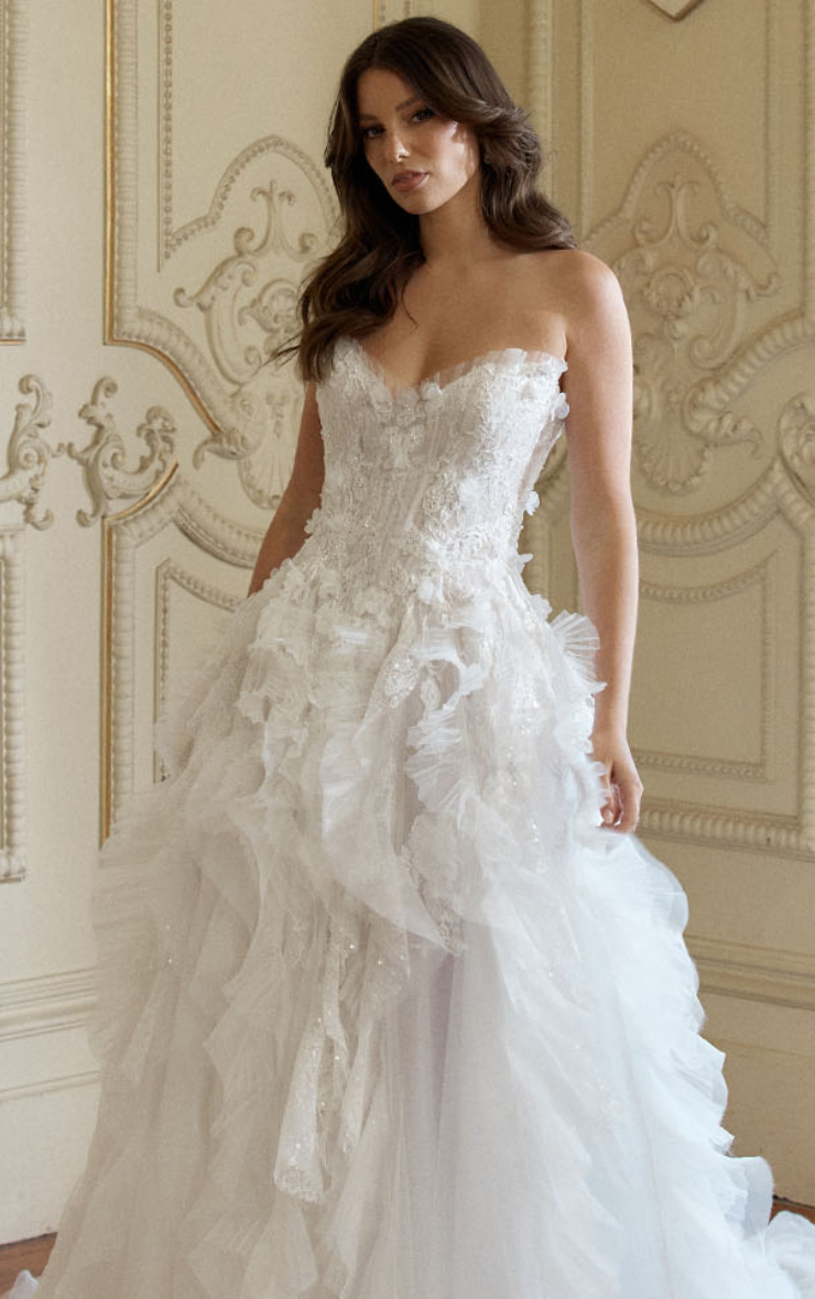 Model wearing a gown by Jeune Bridal