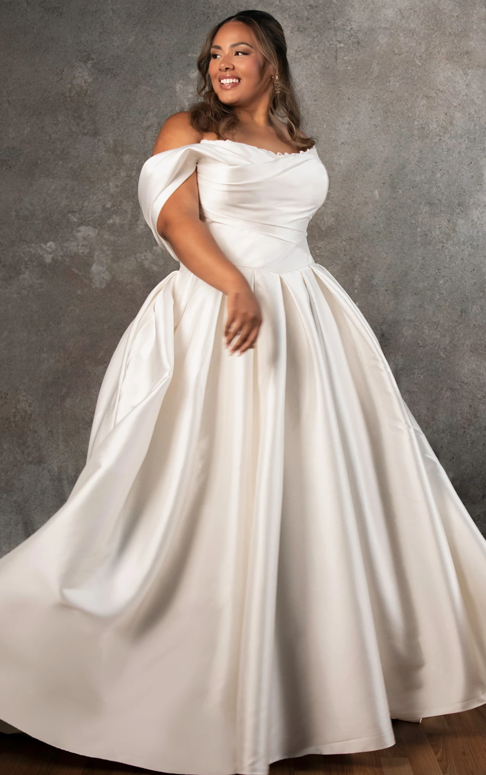 Model wearing a plus size dress