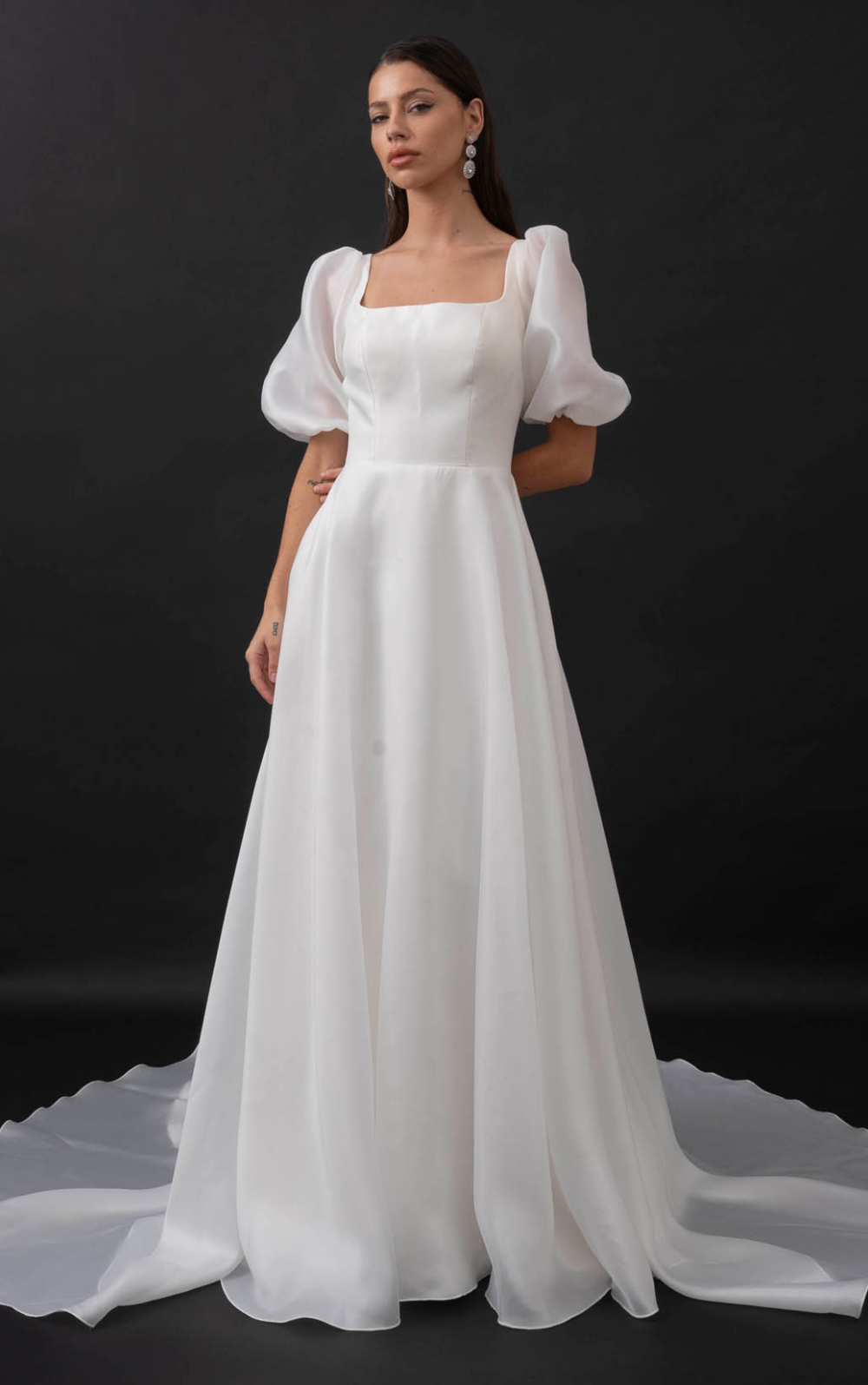 Model wearing a strapless dress