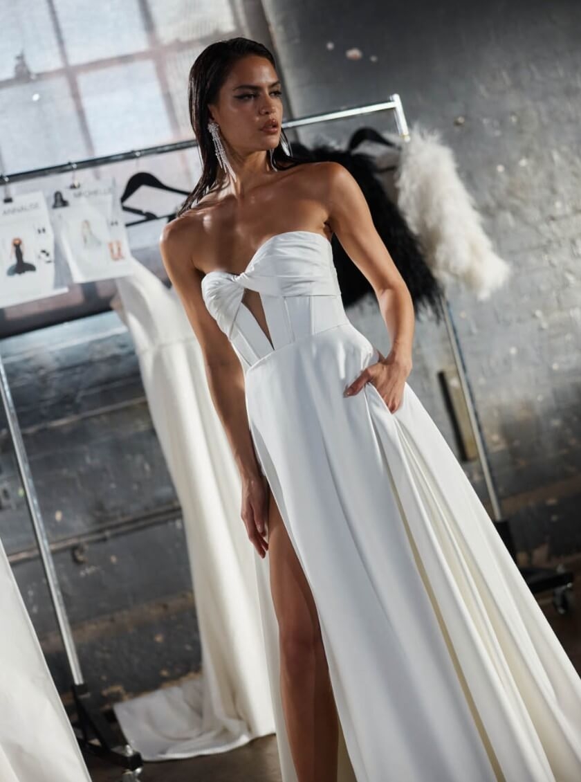 Model wearing a gown by Evie Young