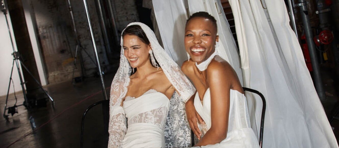 Models wearing a white gowns