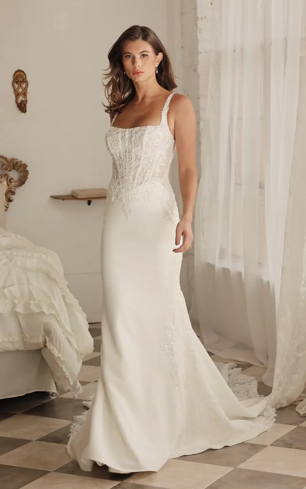 Model wearing a gown by Martina Liana